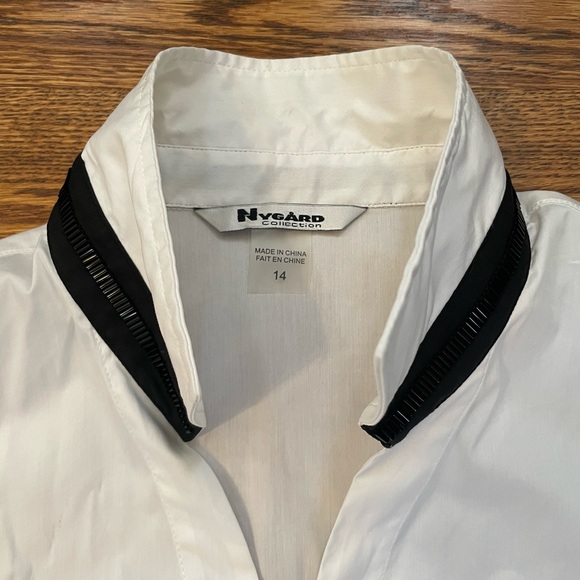 White with black button down shirt. - Picture 3 of 4